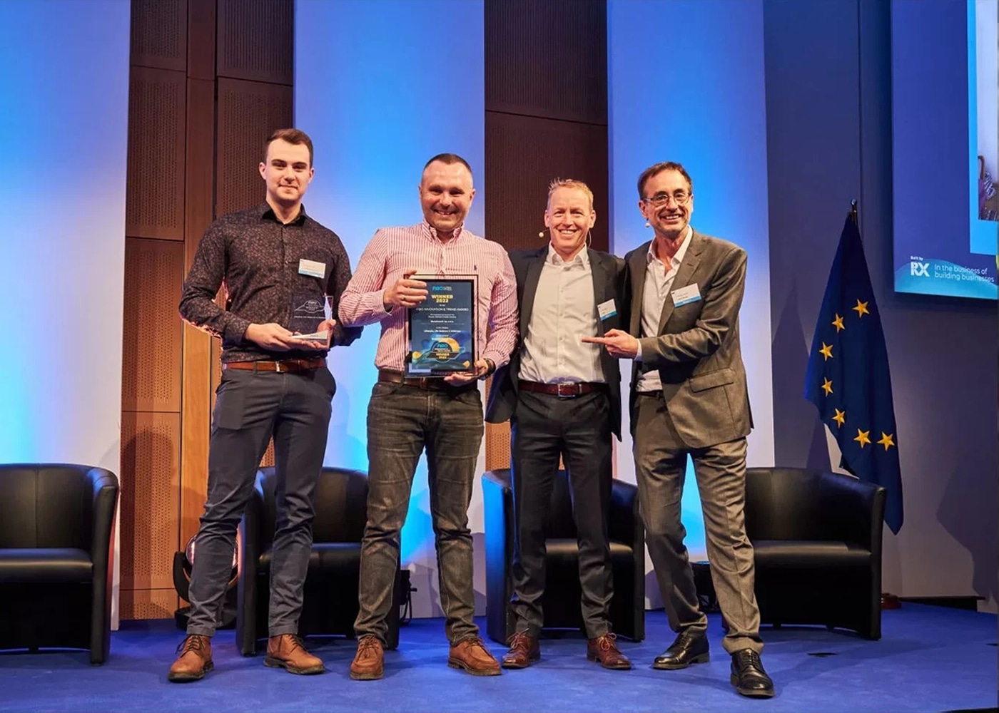 BenchK accepting the FIBO Innovation Award 2022