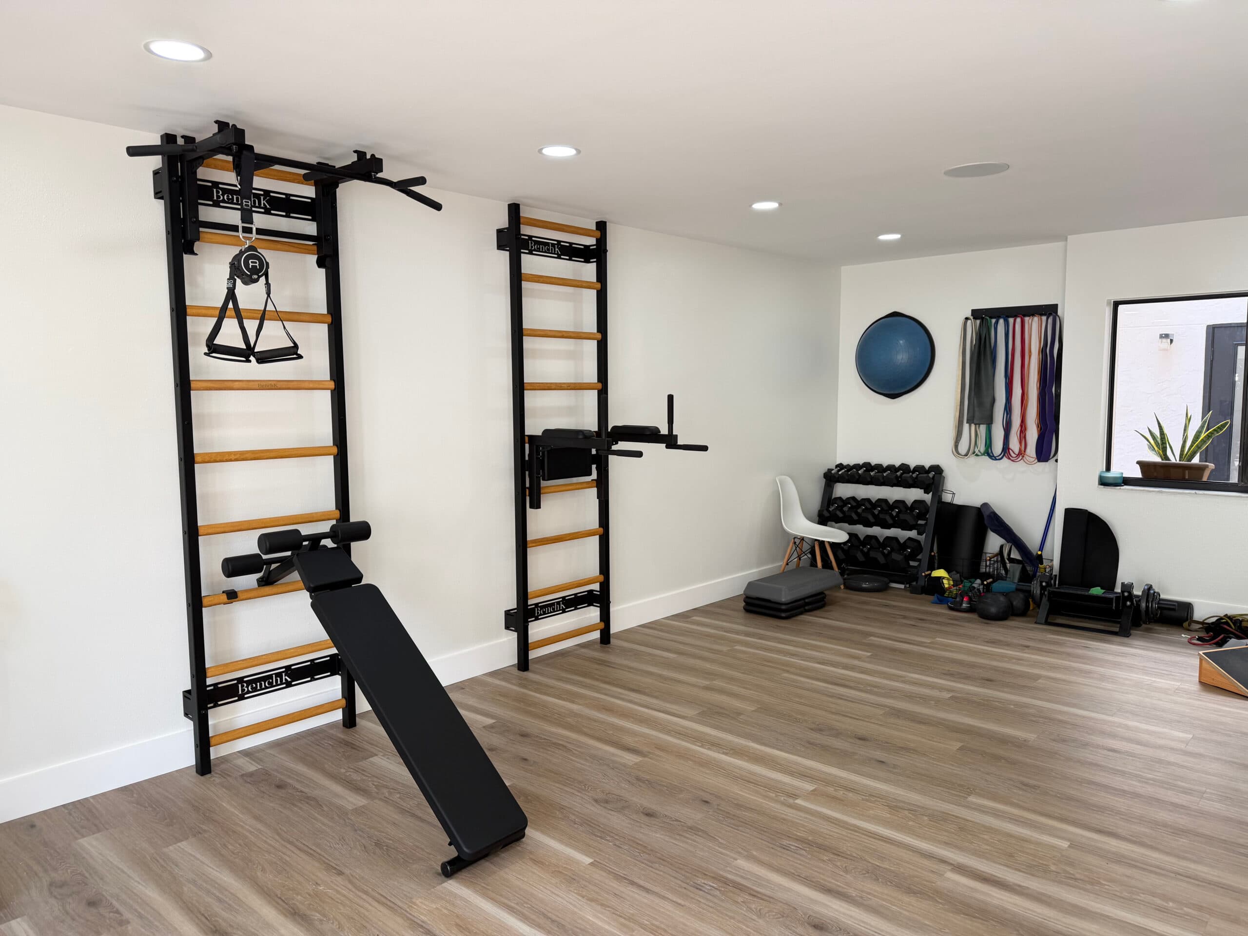 BenchK wall bars with Recoil suspension forming a compact One Wall training zone