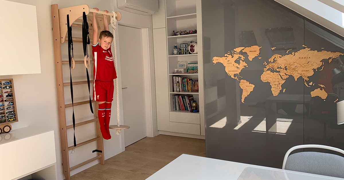 A child training on a gymnastics ladder