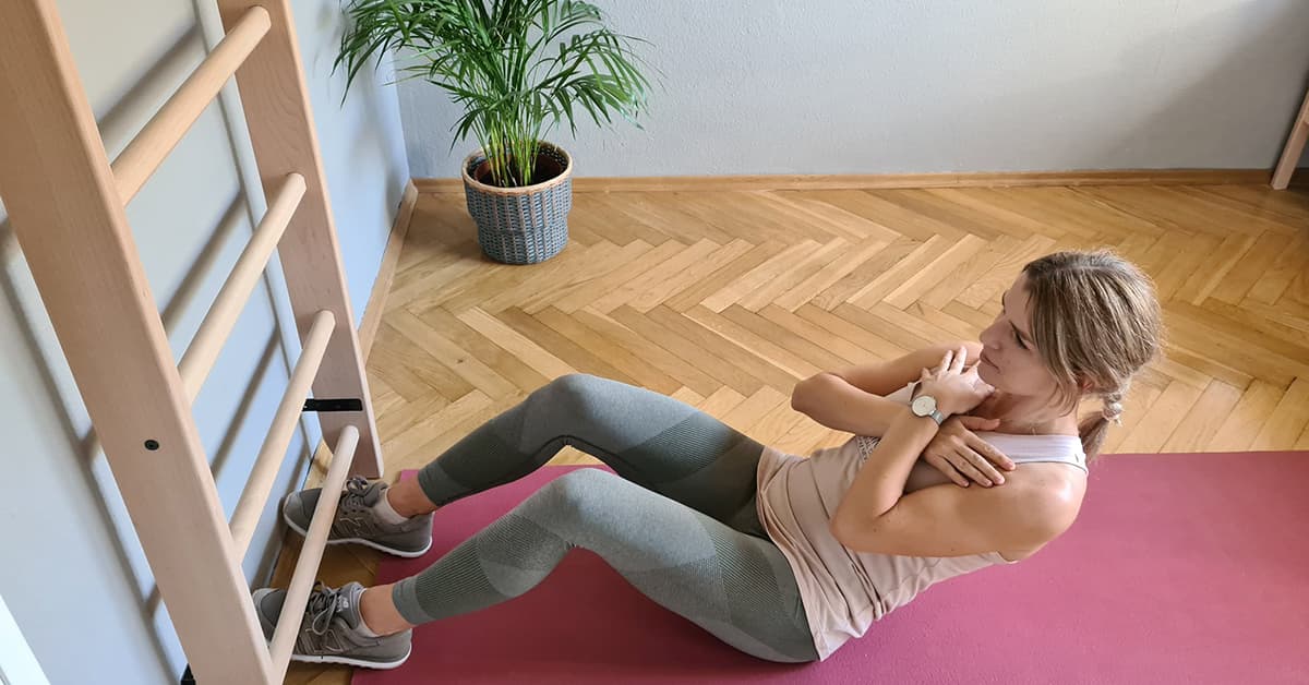 Exercising after childbirth on a gymnastic wall bar