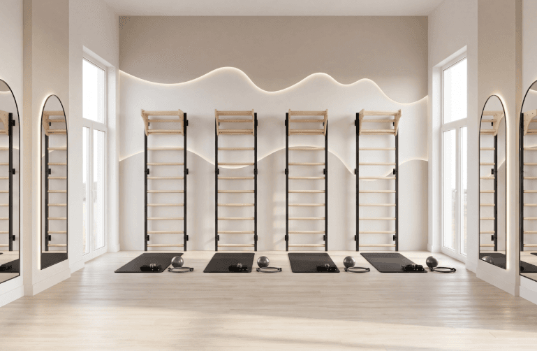 BenchK wall bars in a compact training studio