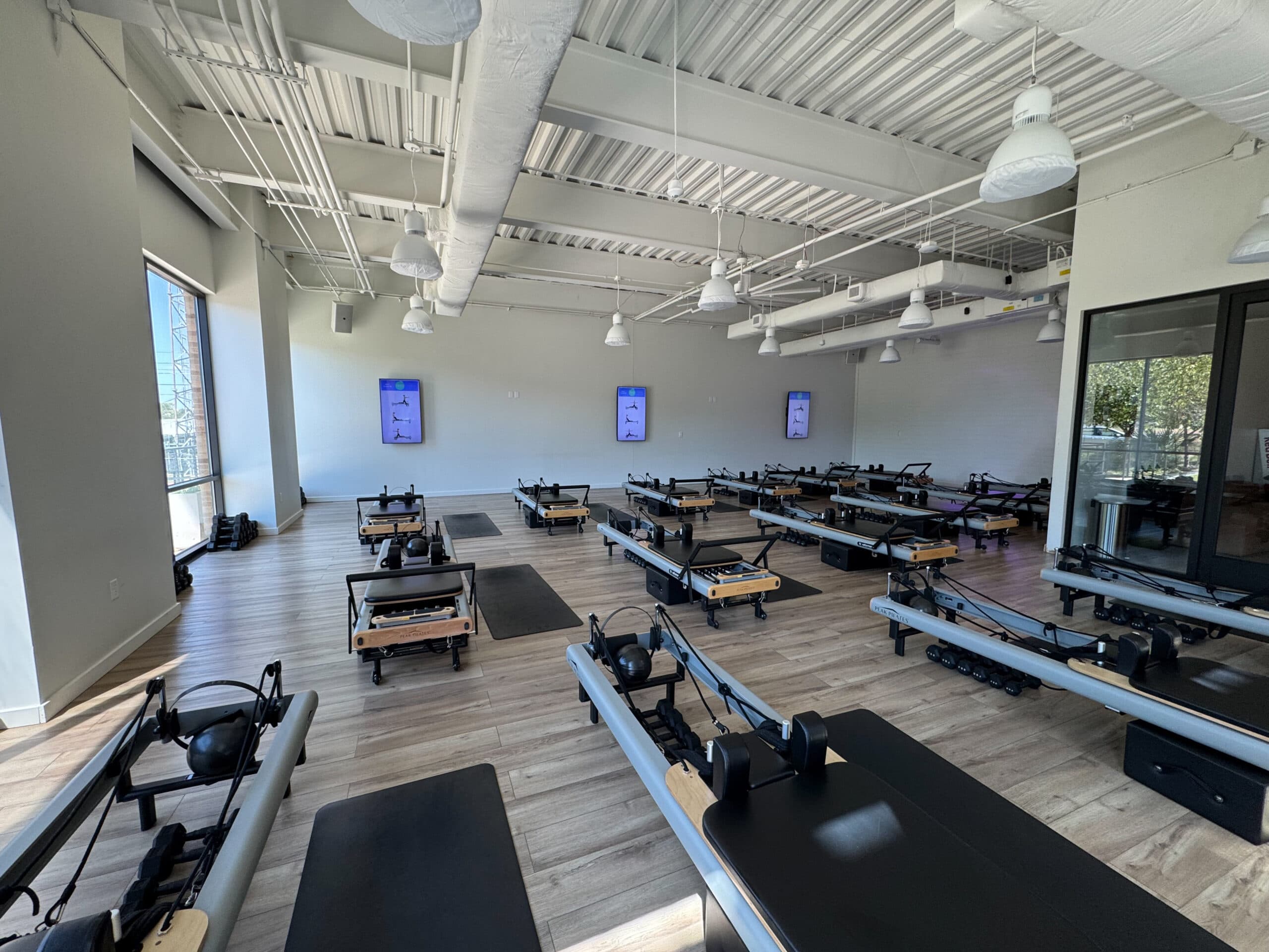 BenchK wall bars in a modern Pilates studio environment
