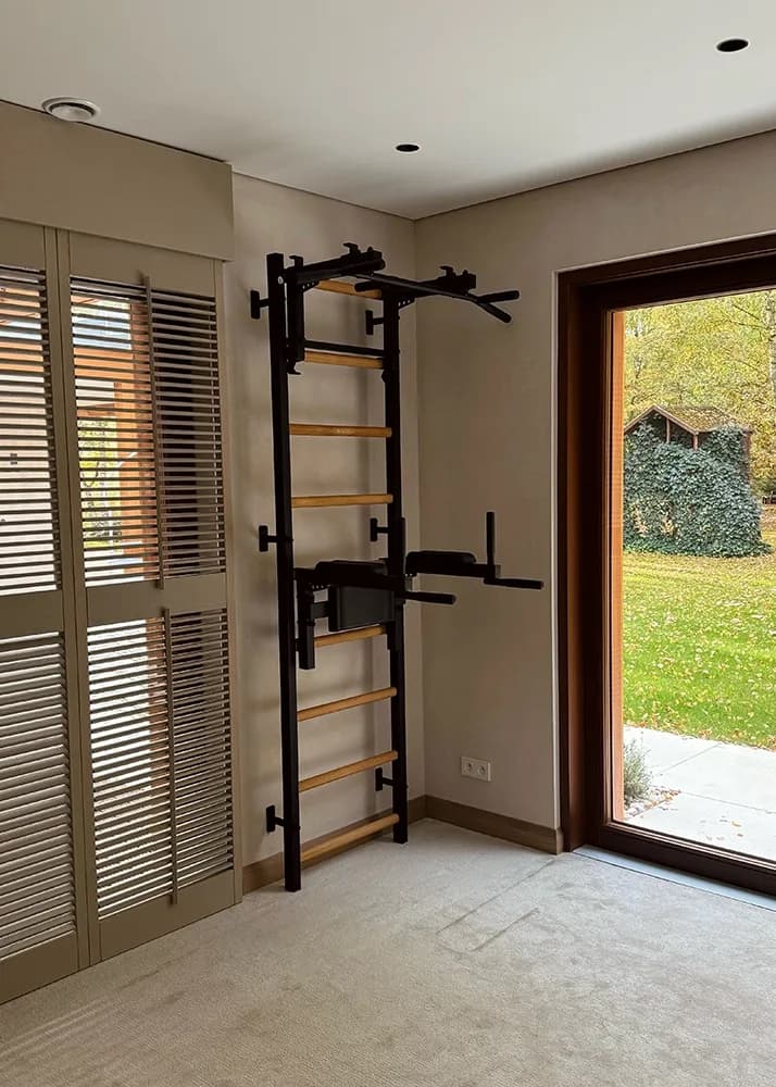 BenchK wall bars in a hotel room and guest fitness space