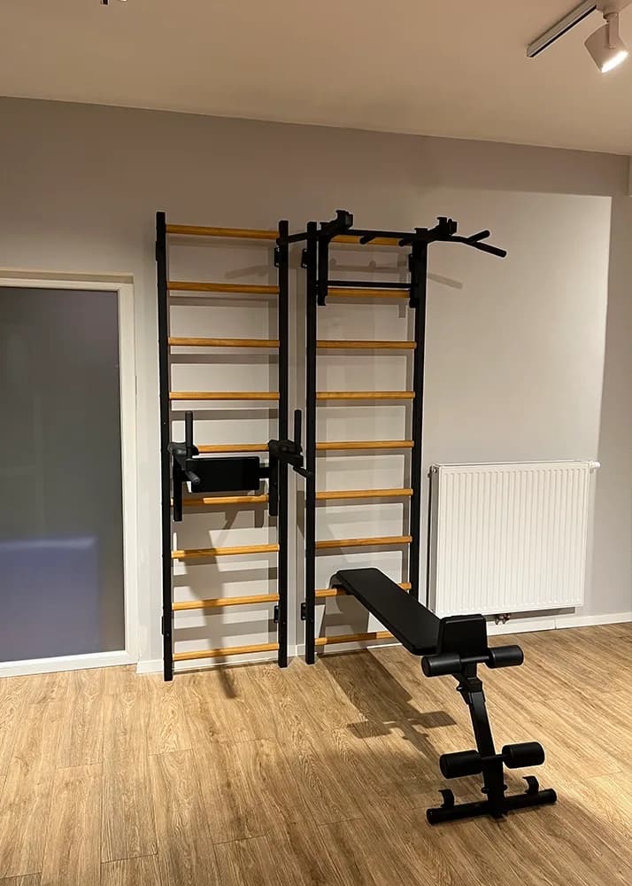 BenchK wall bars in a hotel room and guest fitness space