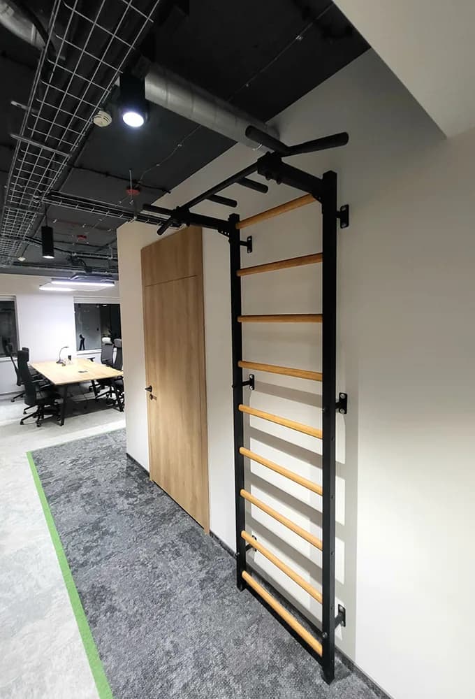BenchK wall bars in an office wellness space